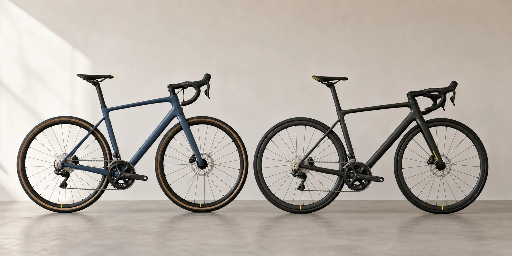 An endurance road bike and a race road bike aligned side by side for a visual geometry comparison